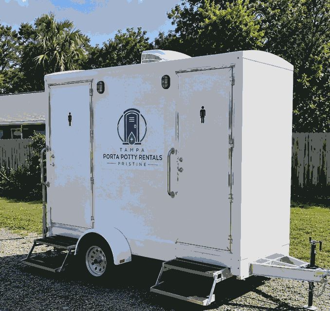 Two-stall portable restroom trailer rental with separate entries in Tampa